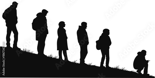 Silhouette of people on a hill