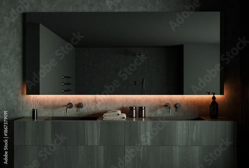 Fototapeta Elegant bathroom interior with large illuminated mirror, wood vanity and subtle ambient lighting on dark textured wall background