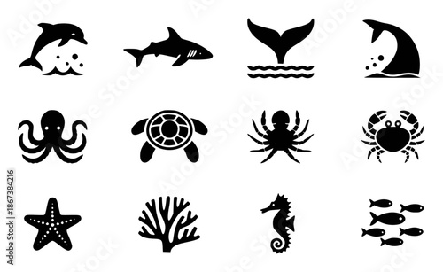 Collection of black silhouette depicting various marine animals and sea life dolphin shark
