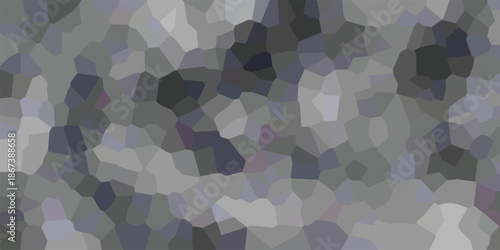 Geometric mosaic pattern with irregular polygonal shapes in shades of gray and dark blue creating a textured, abstract, and modern background effect