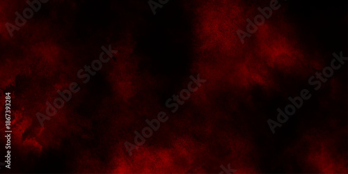 Red clouds in the black sky surreal background with copy space for design, red powder explosion freeze motion of red particles splashing, designed for atmospheric fantasy or horror visual concepts. 