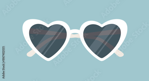 Stylish heart-shaped sunglasses with white frames and dark tinted lenses, set against a solid light blue background for summer vibes.