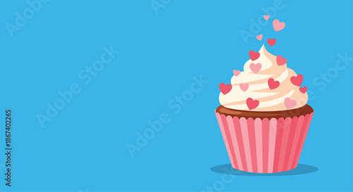 Delicious cupcake with creamy white frosting and decorative pink hearts stands against a vibrant blue background.
