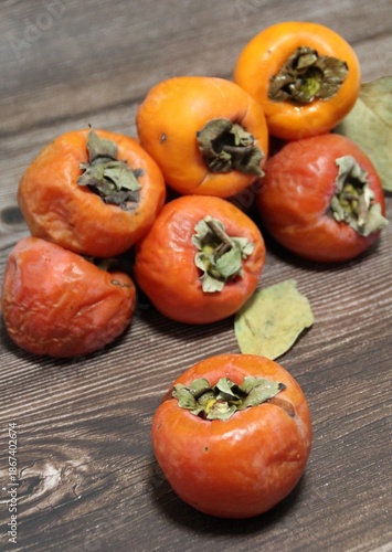  persimmons, orange cherries, autumn fruits, fruits full of vitamins, ripe fruits