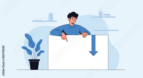 Young man in blue shirt pointing down at a large blank white rectangular poster board for advertisement copy space or a message.