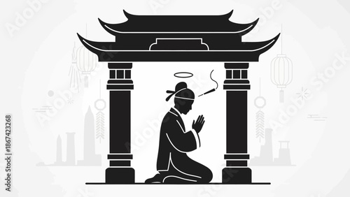 Buddhist monk meditating in prayer.