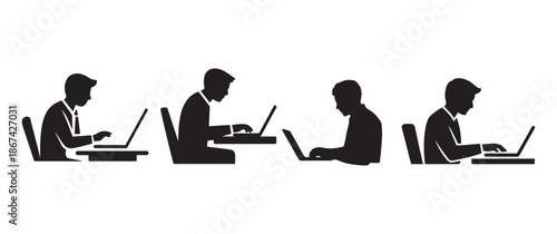 Silhouette of four individuals intensely focused on their laptop computers illustrating modern digital work environments