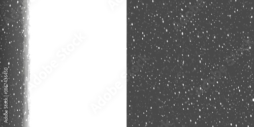 A stark contrast white void against a densely speckled dark background