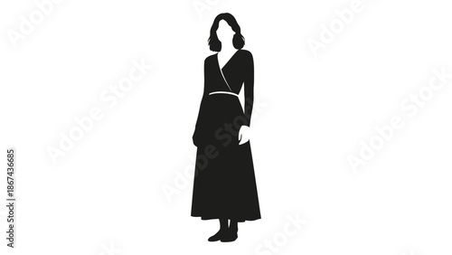 Silhouette of a woman in a long dress standing in a single pose