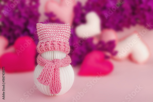 Cute greeting card for Valentine's or Mothers Day. Snowman with handmade hearts and lilac flowers