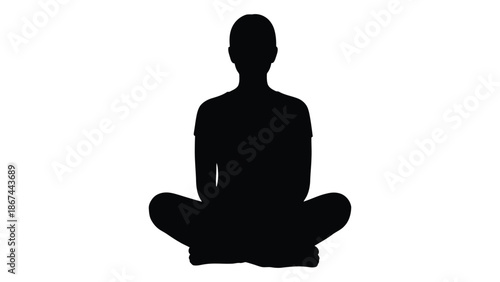 A silhouette of a person meditating in a lotus position