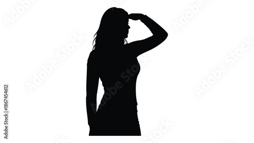 Silhouette of a woman with long hair in a thoughtful pose