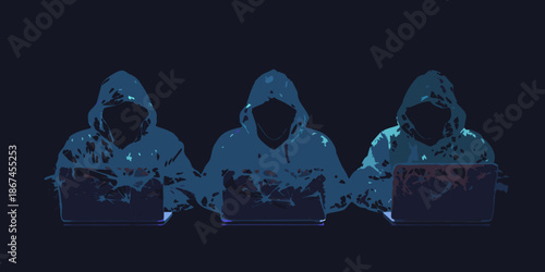 Three hooded figures illuminated by laptop screens in a darkened room