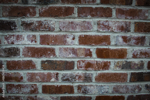 Photos a weathered red brick wall background