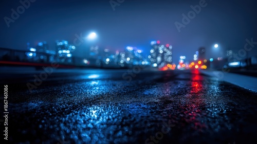 Night Cityscape Reflection on Wet Pavement: Urban Lights and Modern Architecture