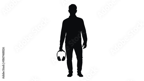 Silhouette of a man holding headphones against a plain white background