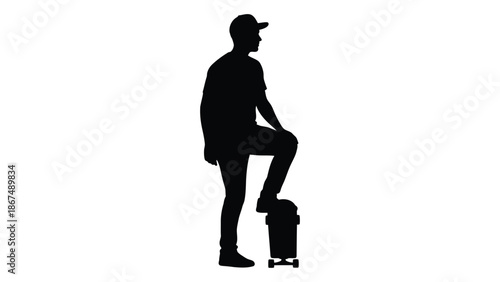 Silhouette of a person standing on a skateboard captured in a dynamic pose