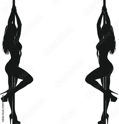 Silhouette of two women in aerial yoga poses