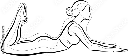 Woman performing salabhasana or locust pose in yoga