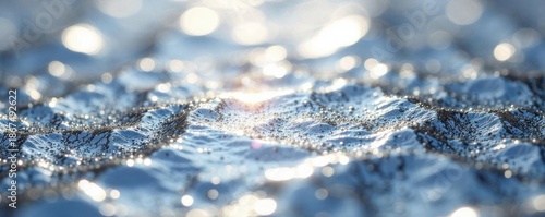 Highly polished silver surface, reflecting light intensely , grey, gleam