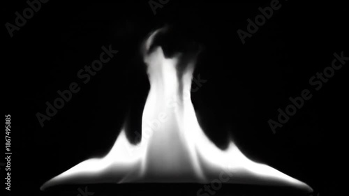 isolated flame on black background with bright white glow