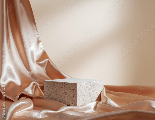 A high end organic product display featuring a square beige marble stone podium