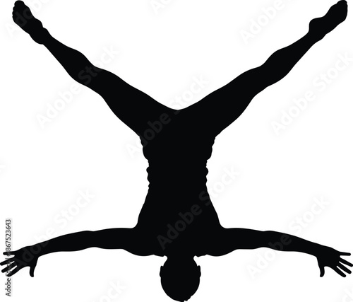 Black Silhouette of Athletic Man Performing a Straddle Handstand Against White Background Highlighting Strength Balance Gymnastics Fitness and Artistic Body Movement