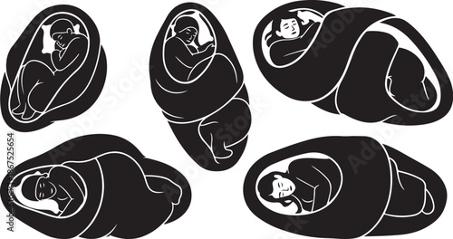 Newborn babies swaddled in blankets sleeping peacefully