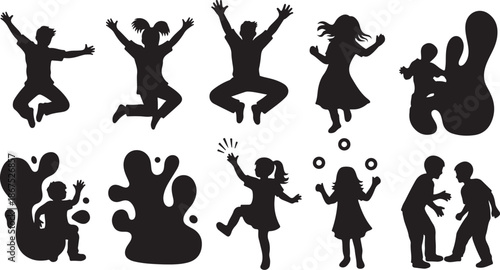 Silhouettes of happy people jumping and playing together outdoors