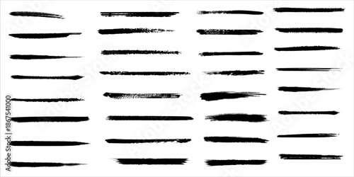 Collection of black brush strokes on a white background for artistic and design purposes