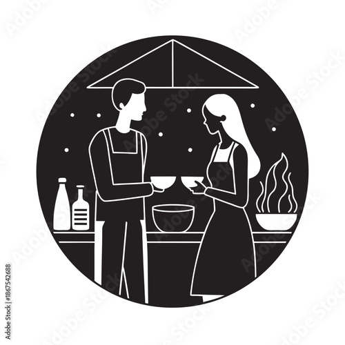 Couple Cooking Evening Meal In Kitchen Silhouette