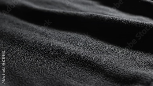 Wallpaper Mural Abstract macro shot of soft black sweatshirt fabric subtly rippling and moving across the frame perfect for a textured background loop website, graphic, cotton Torontodigital.ca