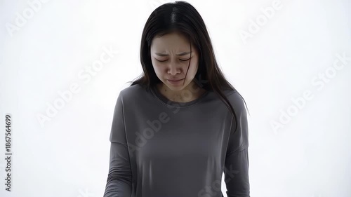 Asian young woman sick and coughing on white background
