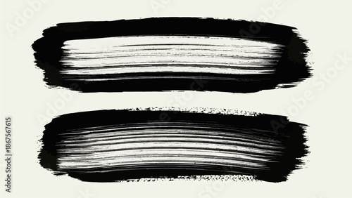 Abstract black brush strokes on a cream background, representing artistic expression and design elements