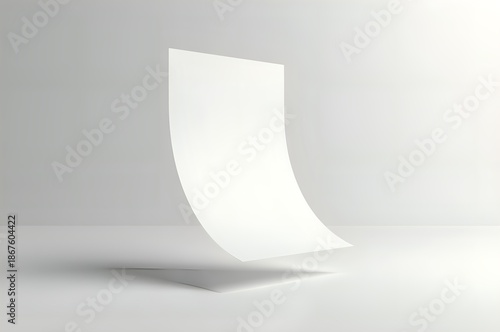 Floating Paper Sheet on White Surface
