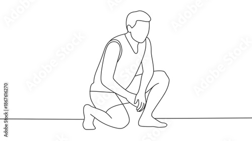 A man in a kneeling position with his head down, appearing to be tired or contemplative