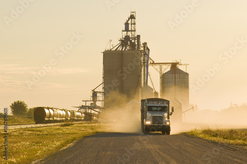 Tableau sur toile a truck leaves an inland grain terminal after hauling grain, near Humboldt, Sask