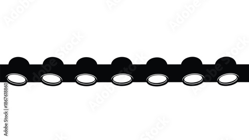 Black silhouette of a track lighting fixture with round lights on a isolated on white background