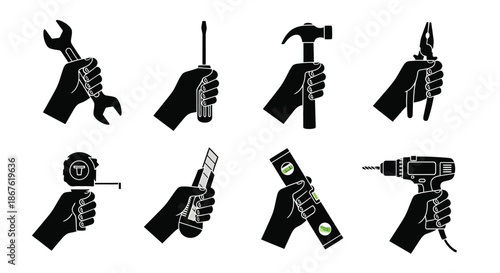 Hands holding various black silhouette tools wrenches screwdrivers hammers and power drills