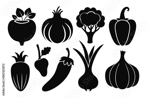 Eight distinct black and white vegetable silhouettes in a clean set, perfect for healthy food branding