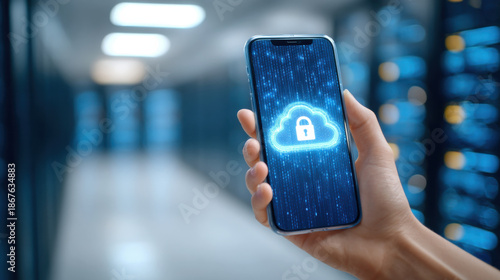 Cloud security concept with hand holding smartphone displaying locked cloud icon, digital data protection, secure backup