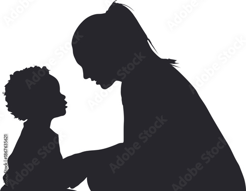 Mother and child in a tender moment silhouette