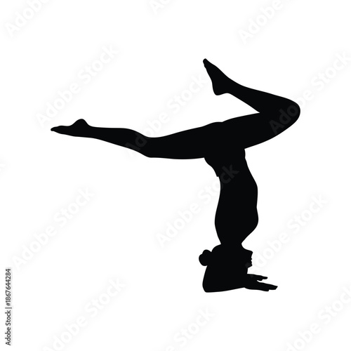 Black silhouette of a woman performing a yoga handstand pose desig