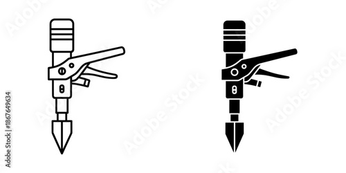 Two Pliers Holding a Metal Rod in Black and White