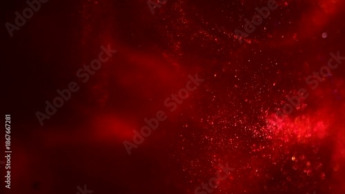 Red particles floating background, Liquid red metallic dust,  abstract backdrop. Beautiful metallic dust texture, fractal, paint close-up. Art Wallpaper waves surface.  