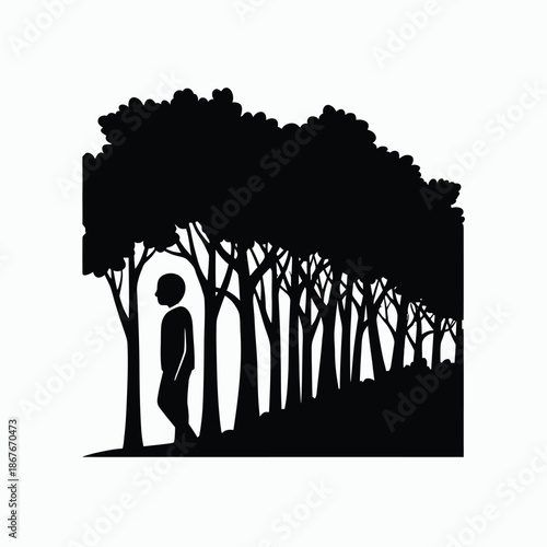 Silhouette of a person in a forest