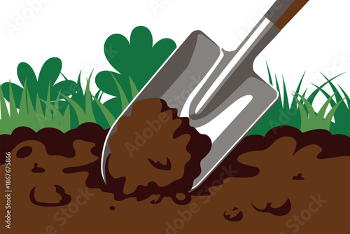 A shovel digging into the soil with green grass in the background