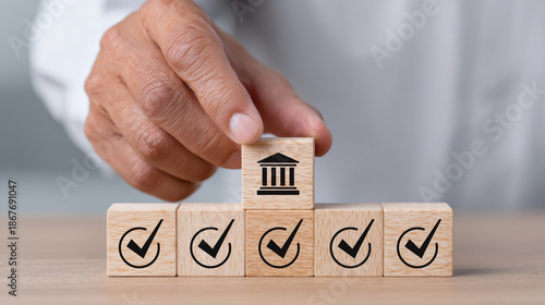 Regulation and good governance for transparent, accountable, and sustainable business operations. Wooden blocks with check marks, symbolizing corporate regulatory and compliance, ethical corporate.