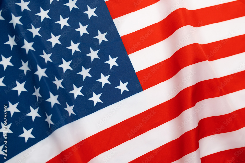 Fototapeta premium United states flag USA featuring red stripes, white stripes, blue canton, and white stars, creating background patriotic