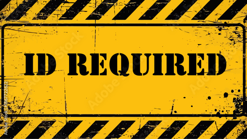 Grunge Style Yellow and Black "ID REQUIRED" Warning Sign with Distressed Stencil Font and Diagonal Hazard Stripes